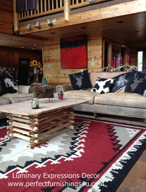 Red Two Grey Hills Ganado wool rug in rustic cabin
